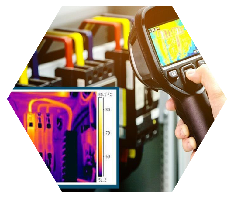 A person is using an infrared camera to check the temperature of pipes.